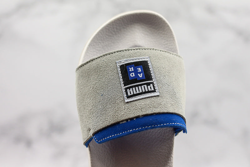 Les sandales claquettes Puma sont la combinaison parfaite entre un design sportif et un confort optimal, idéales pour un usage quotidien.