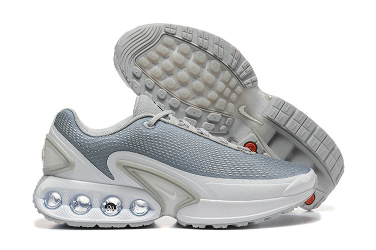 Les baskets Nike Air Max DN combinent un style contemporain et une performance avancée.

Leur design épuré et l'utilisation de matériaux innovants en font un choix incontournable