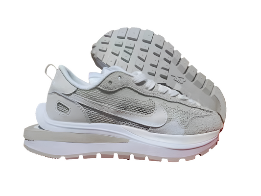 Les Baskets Nike LDWaffle x Sacai combinent style audacieux et innovation. Leur design surdimensionnées . Pas cher. Le moins cher.