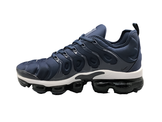 Les Nike Air Vapormax Plus TN Femme incarnent une fusion audacieuse entre l’héritage des baskets TN des années 90 et l’innovation moderne de la technologie Vapormax.