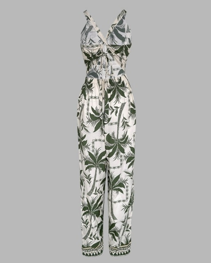 Premièrement : Plongez dans l’ambiance des vacances avec cette Combinaison à imprimé floral, col en V , bretelles spaghetti, dos décontracté, détail noué , barboteuse de vacances femme.