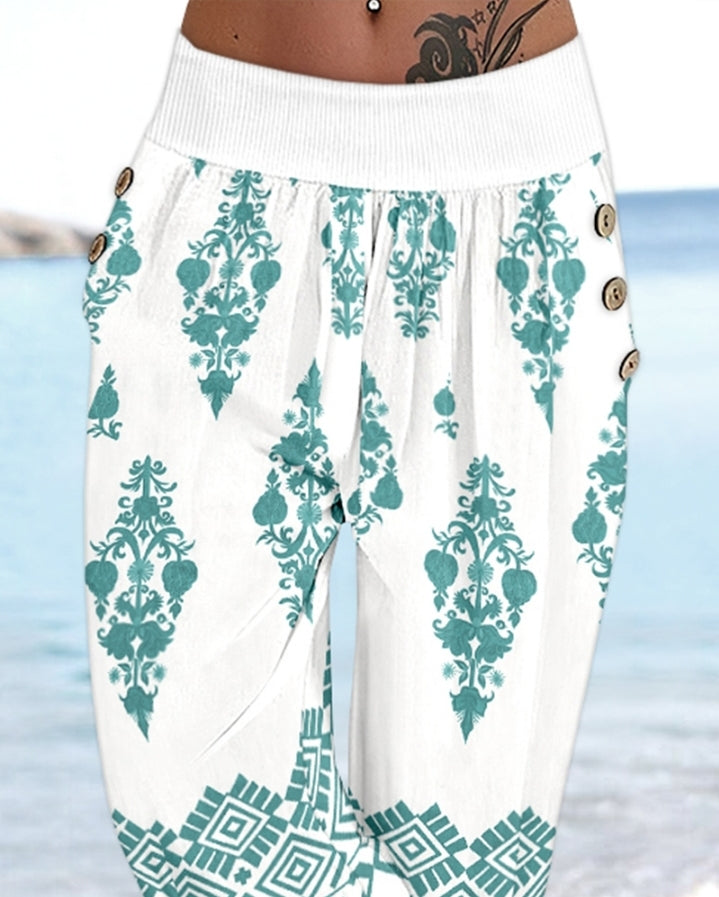Premièrement : Ce Pantalon capri taille basse à imprimé plante tribales avec boutons décoratifs, pantalon de vacances avec poche femme .