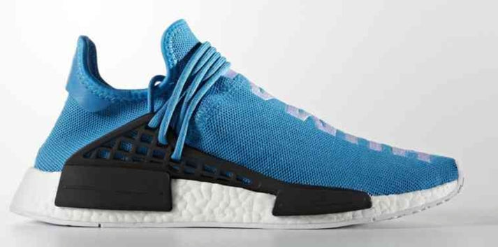 les baskets Adidas Human Race NMD x Pharrell Yellow " Femme  sont un témoignage de l'engagement d'Adidas à combiner style et innovation.