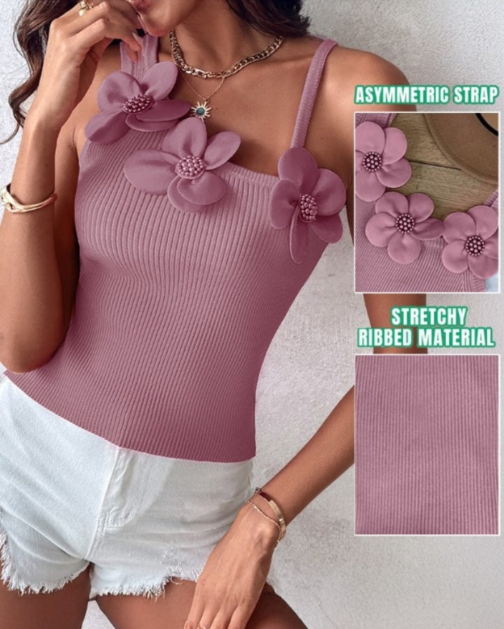 Premièrement : Ce 1 débardeur en tricot à motif floral et perles décoratives sans manches femme.