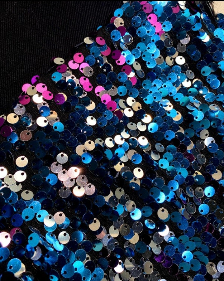 Premièrement : Apportez une touche d’éclat à votre look avec cette Veste décontractée à paillettes et patchwork à manches longues avec bouton sur le devant et ourlet brut femme 