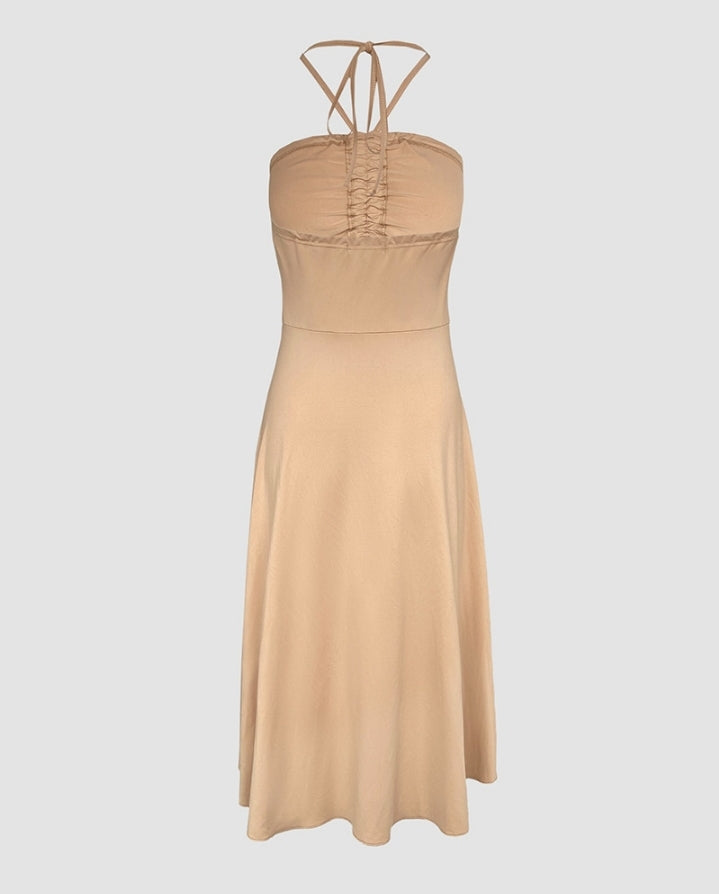 Premièrement : Ce Haut long sans manches à col licou et bandeau froncé style décontracté Femme.