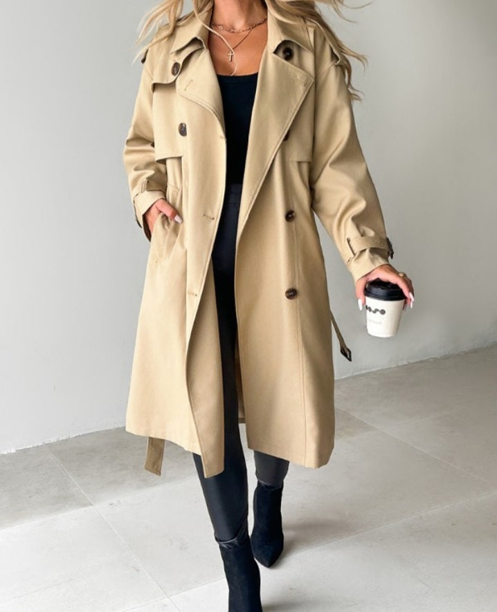 Premièrement : Adoptez un look sophistiqué et indémodable avec ce Trench -coast long croisé à col cranté femme