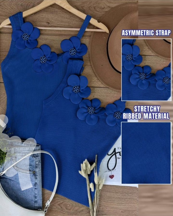 Premièrement : Ce 1 débardeur en tricot à motif floral et perles décoratives sans manches femme.