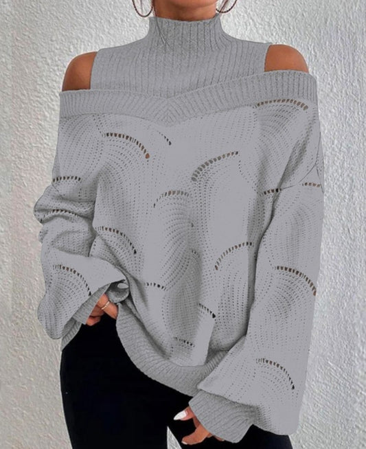 Openwork knit sweater with lantern sleeves and off-the-shoulder