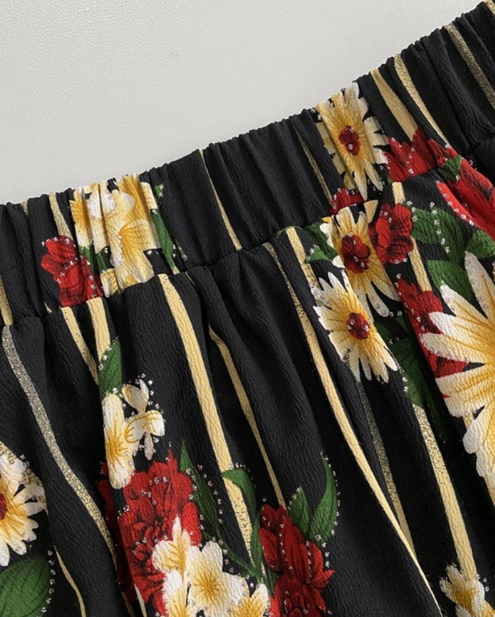 Premièrement : La Combinaison dos nu à col en V avec ourlet à jupe et ceinture froncée femme.