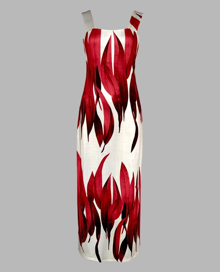Premièrement : Cette robe longue décontractée à bretelles épaisses et imprimé végétal, coupe ajustée et fendue avec poches Femme.