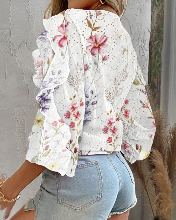 Premièrement : Ce séduit par son Chemisier à imprimé floral avec broderie à oeillets plongeant et volants, manches longues, boutons , chemises décontractées femme. 