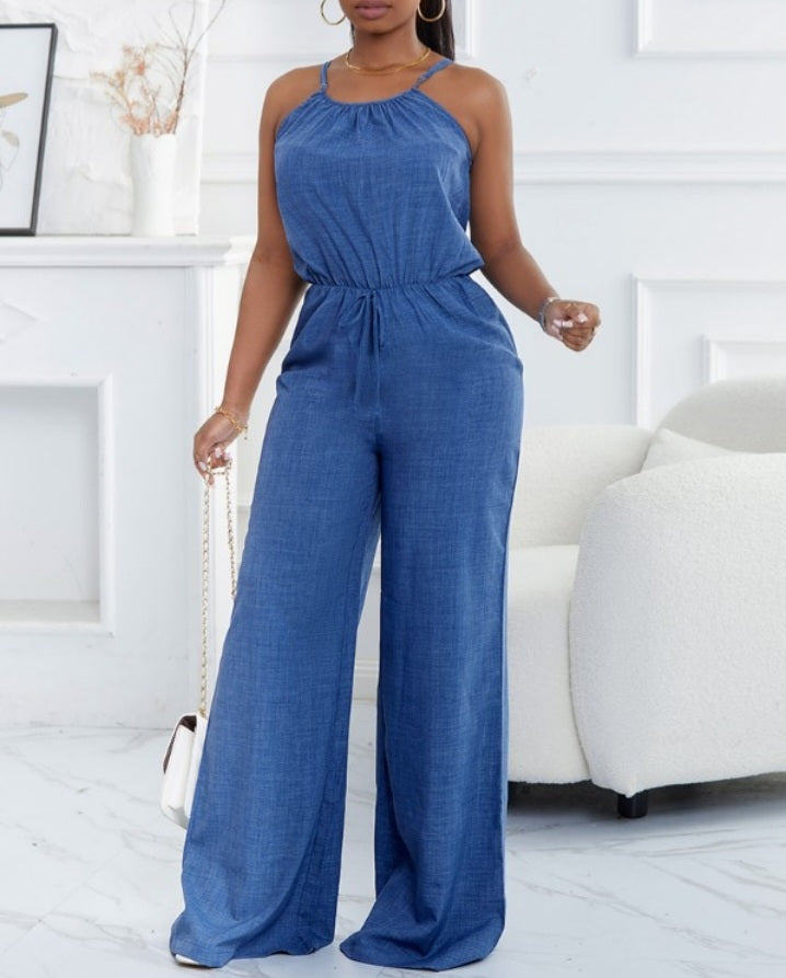 Premièrement : Adoptez un style chic et décontracté avec cette Combinaison courte décontractée à pois , et froncées sans manches avec détails noués et boutons décoratifs femme 