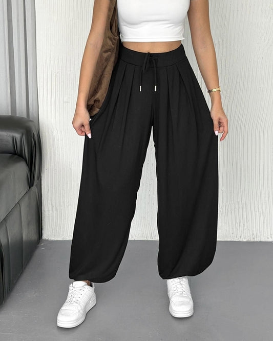 Premièrement : Ce Pantalon taille haute élastique à revers et cordon de serrage , coupe ample et décontractée , froncé Femme .