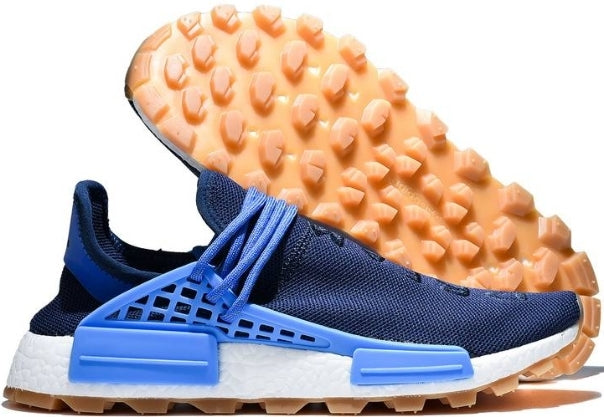 les baskets Adidas Human Race NMD x Pharrell Yellow " Femme  sont un témoignage de l'engagement d'Adidas à combiner style et innovation.