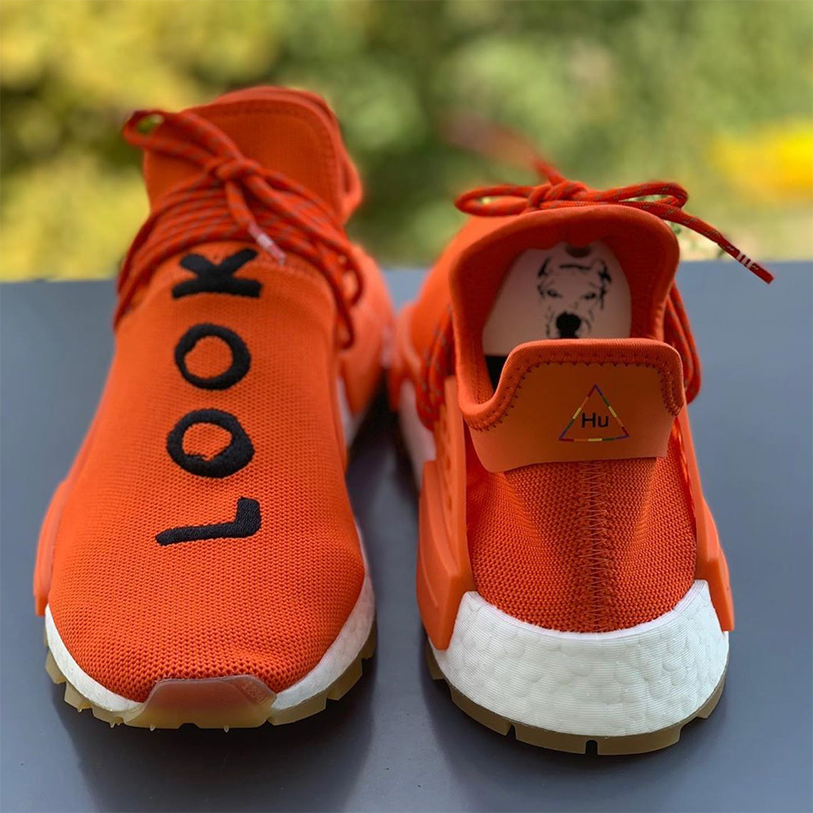 les baskets Adidas Human Race NMD x Pharrell Yellow " Femme  sont un témoignage de l'engagement d'Adidas à combiner style et innovation.