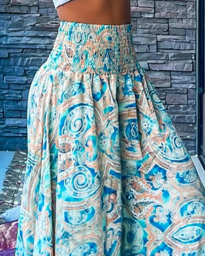 Premièrement : Le Pantalon larges , taille haute, à imprimé tropical femme, est la pièce parfaite pour insuffler une touche d’exotisme à votre garde-robe.