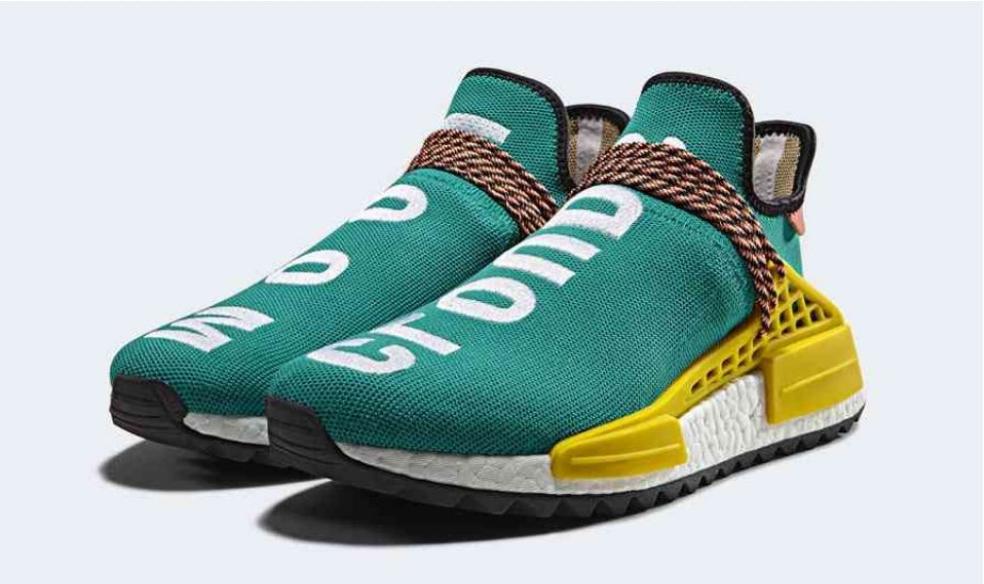 les baskets Adidas Human Race NMD x Pharrell Yellow " Femme  sont un témoignage de l'engagement d'Adidas à combiner style et innovation.