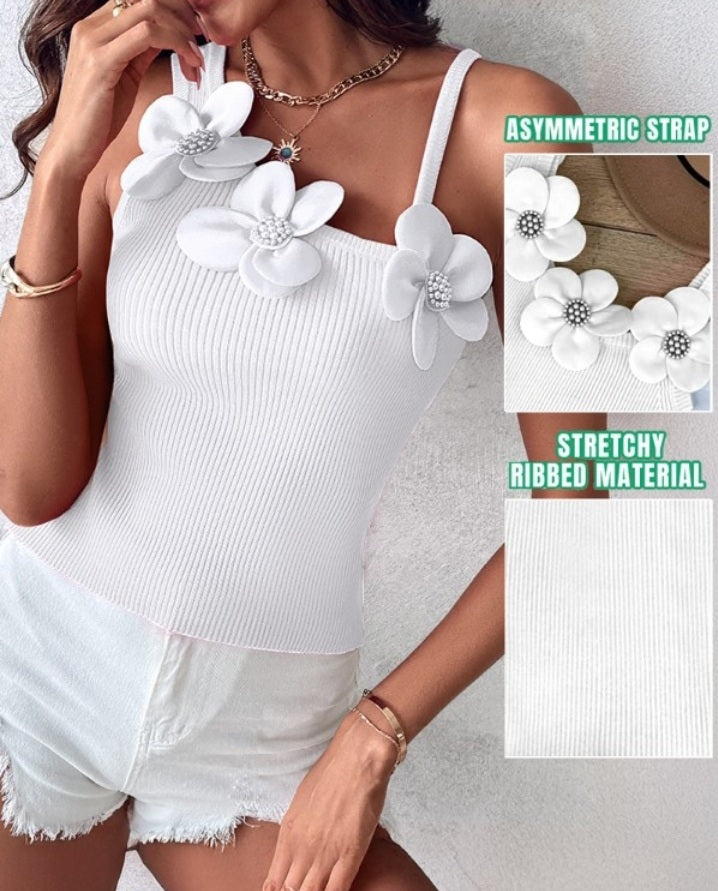 Premièrement : Ce 1 débardeur en tricot à motif floral et perles décoratives sans manches femme.