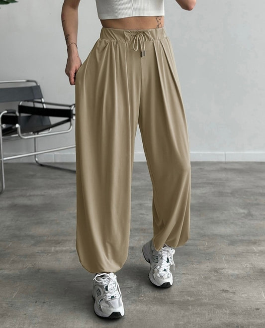 Premièrement : Ce Pantalon taille haute élastique à revers et cordon de serrage , coupe ample et décontractée , froncé Femme .