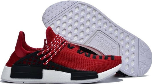 les baskets Adidas Human Race NMD x Pharrell Yellow " Femme  sont un témoignage de l'engagement d'Adidas à combiner style et innovation.