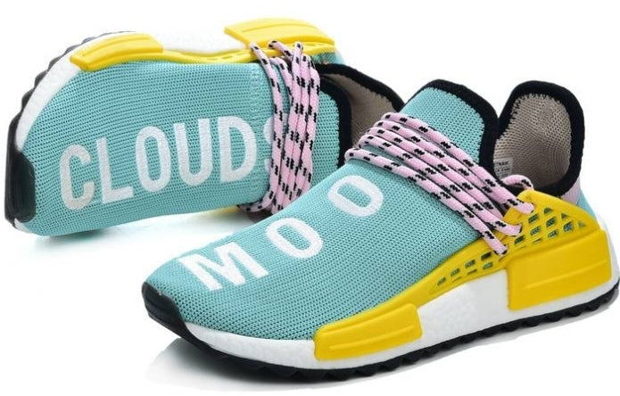 les baskets Adidas Human Race NMD x Pharrell Yellow " Femme  sont un témoignage de l'engagement d'Adidas à combiner style et innovation.