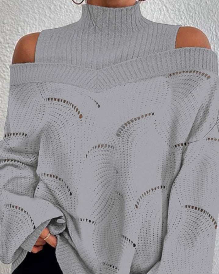 Openwork knit sweater with lantern sleeves and off-the-shoulder