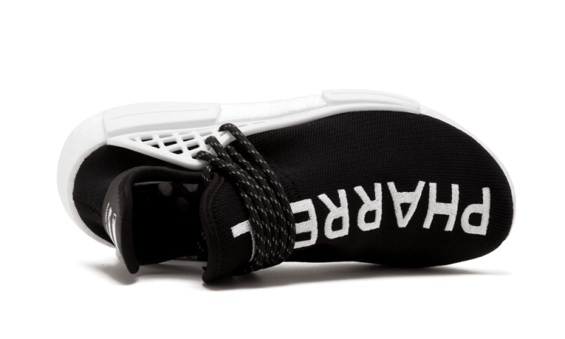 les baskets Adidas Human Race NMD x Pharrell Yellow " Femme  sont un témoignage de l'engagement d'Adidas à combiner style et innovation.