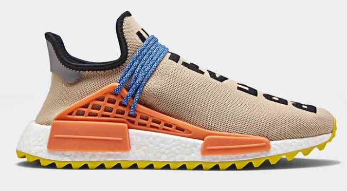 les baskets Adidas Human Race NMD x Pharrell Yellow " Femme  sont un témoignage de l'engagement d'Adidas à combiner style et innovation.