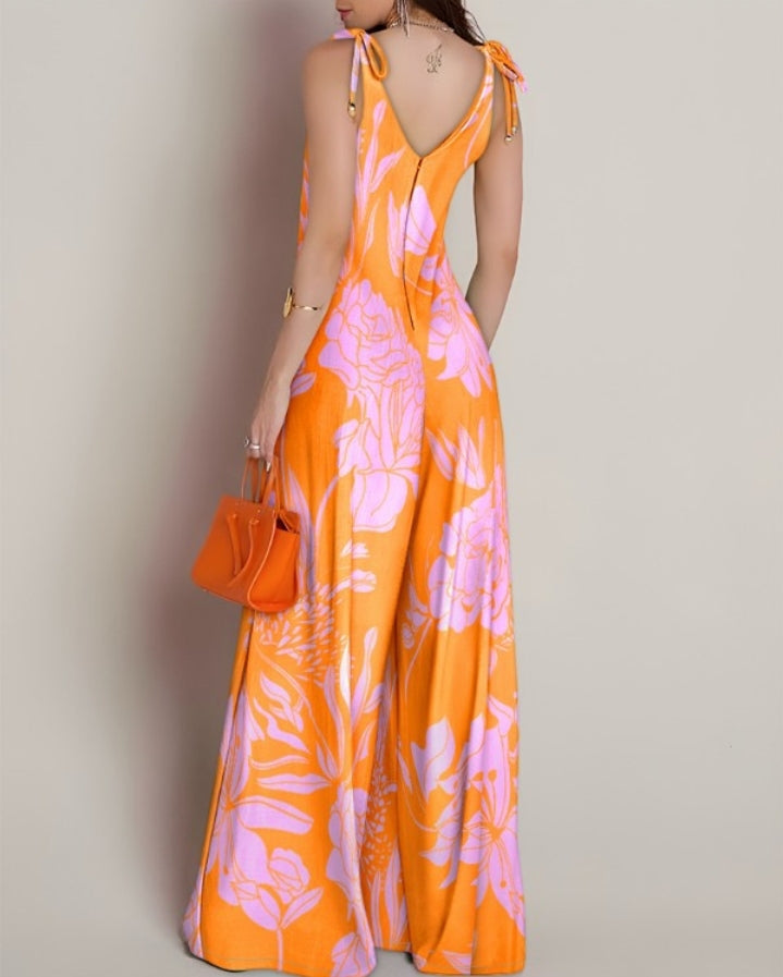 Premièrement : Apportez une touche de fraîcheur et de féminité à votre garde-robe avec cette Combinaison à imprimé floral, col en V, bretelles à lacets , style décontracté avec poches Femme.