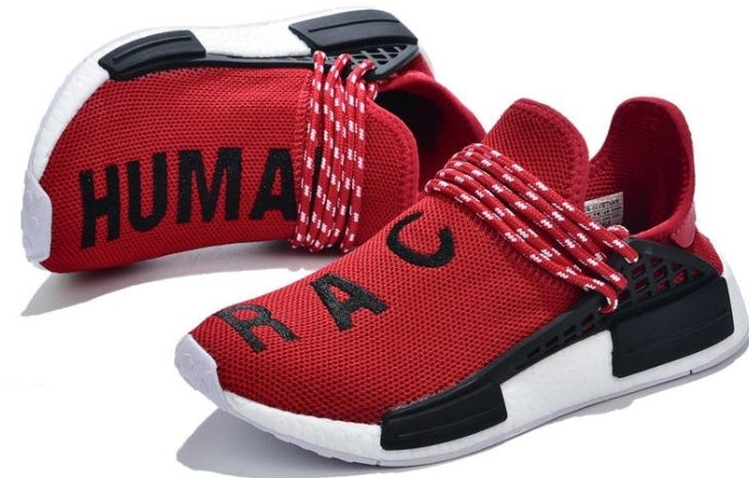 les baskets Adidas Human Race NMD x Pharrell Yellow " Femme  sont un témoignage de l'engagement d'Adidas à combiner style et innovation.