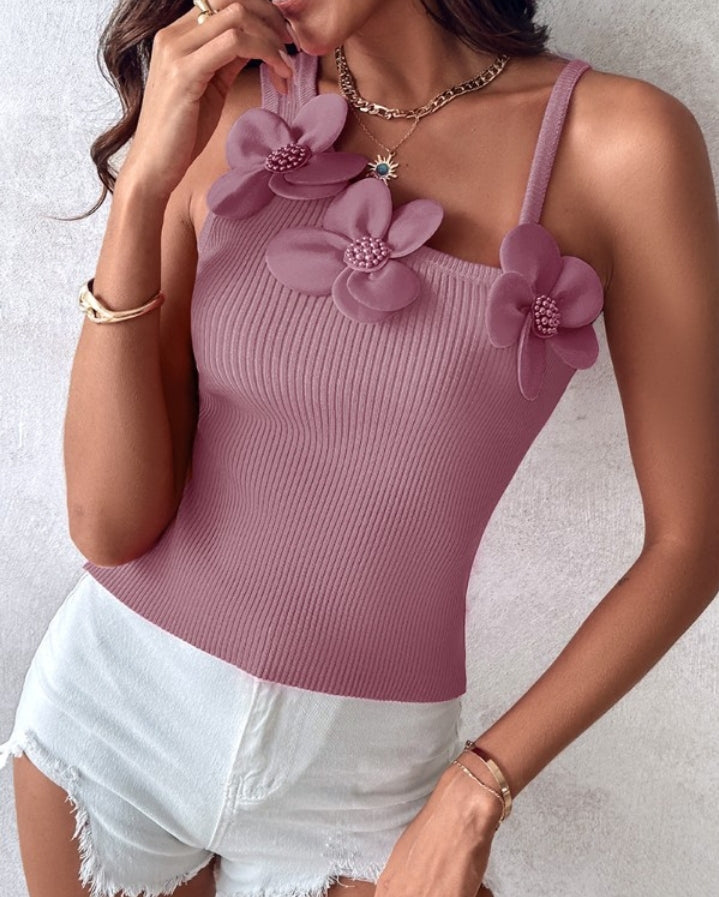 Premièrement : Ce 1 débardeur en tricot à motif floral et perles décoratives sans manches femme.