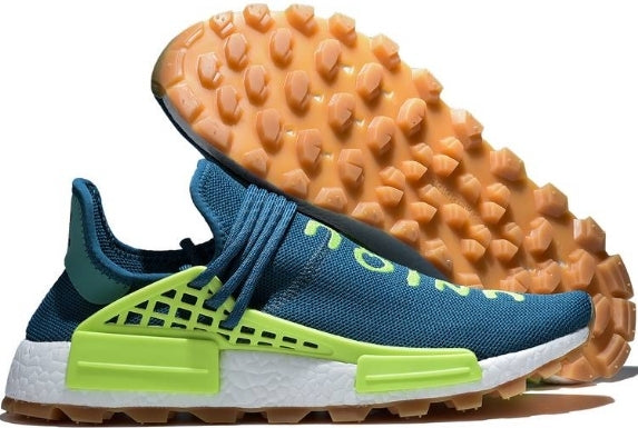 les baskets Adidas Human Race NMD x Pharrell Yellow " Femme  sont un témoignage de l'engagement d'Adidas à combiner style et innovation.