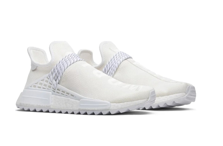 les baskets Adidas Human Race NMD x Pharrell Yellow " Femme  sont un témoignage de l'engagement d'Adidas à combiner style et innovation.