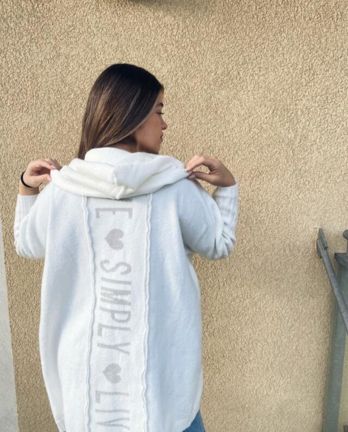 Long knitted cardigan with hood and heart print