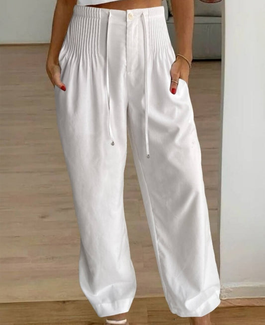 Premièrement : Ce Pantalon décontracté droit à cordons froncées Femme pour incarne l’équilibre parfait entre aisance et élégance au quotidien.