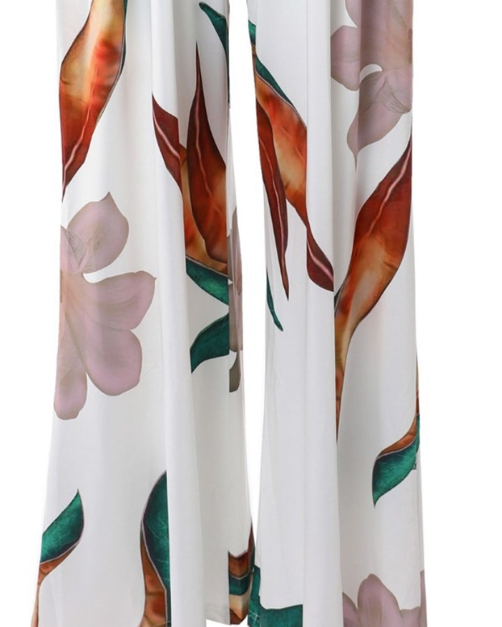 Premièrement : Adoptez un look frais et élégant avec cette Combinaison à jambes larges et épaules dénudées à imprimé plantes femme.