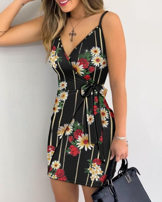 Premièrement : Cette Robe courte décontractée à bretelles spaghetti et col en V à imprimé floral pailetté avec détails croisés Femme.