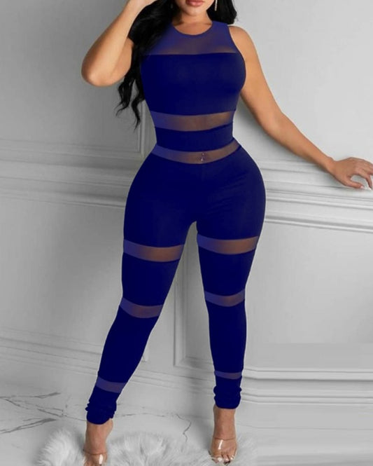 Premièrement : Osez un look audacieux avec cette Combinaison skinny sans manches en maille transparente femme. 
