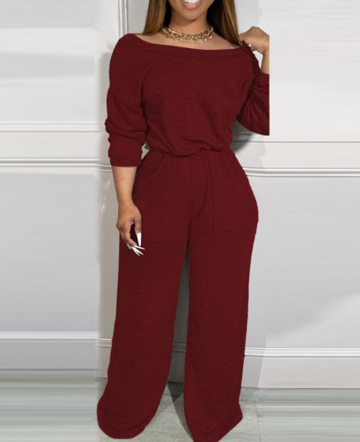 Combinaison à épaules dénudées et dos en V avec poches à la taille extensible femme