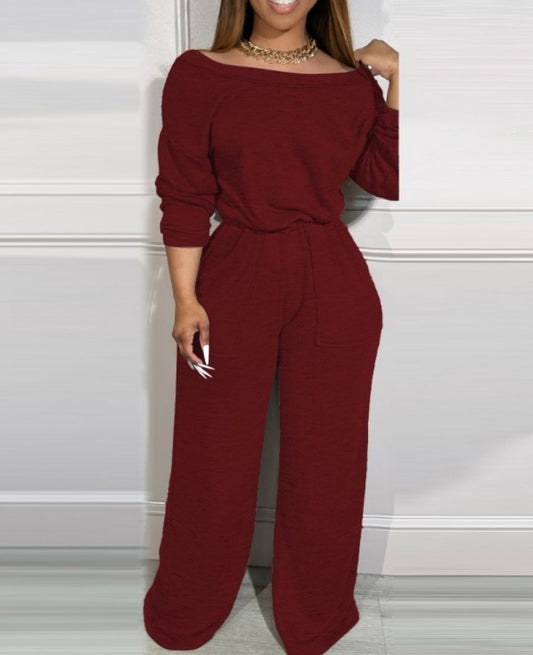 Combinaison à épaules dénudées et dos en V avec poches à la taille extensible femme