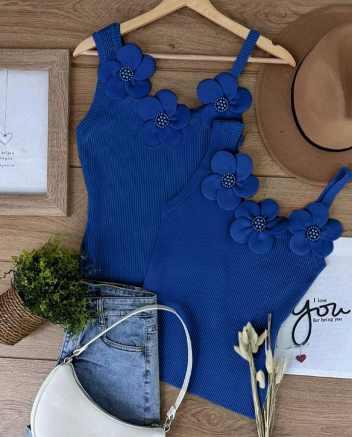 Premièrement : Ce 1 débardeur en tricot à motif floral et perles décoratives sans manches femme.