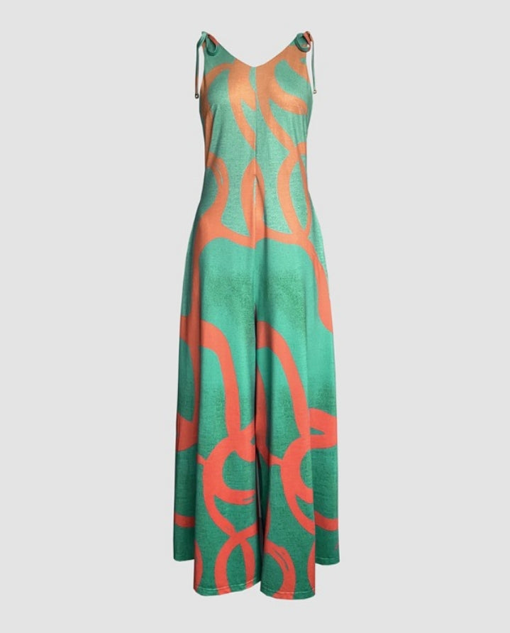 Premièrement : Apportez une touche de fraîcheur et de féminité à votre garde-robe avec cette Combinaison à imprimé floral, col en V, bretelles à lacets , style décontracté avec poches Femme.
