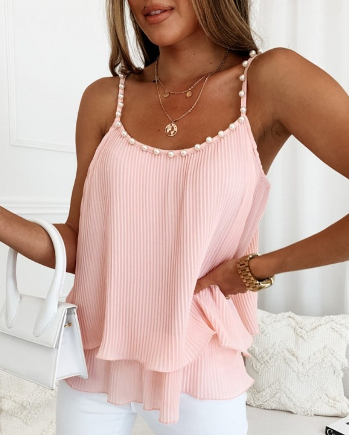 Premièrement : Ce Haut caraco superposé à décor de perles Femme.