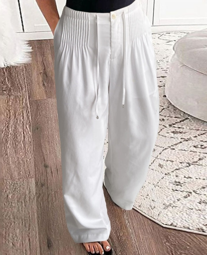 Premièrement : Ce Pantalon décontracté droit à cordons froncées Femme pour incarne l’équilibre parfait entre aisance et élégance au quotidien.