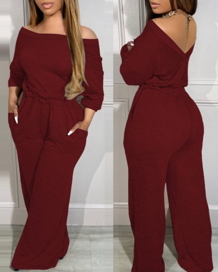 Combinaison à épaules dénudées et dos en V avec poches à la taille extensible femme