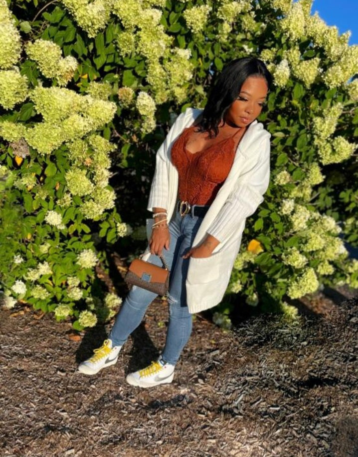 Long knitted cardigan with hood and heart print