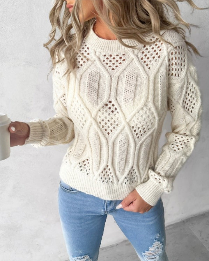 Openwork knit sweater with high neck