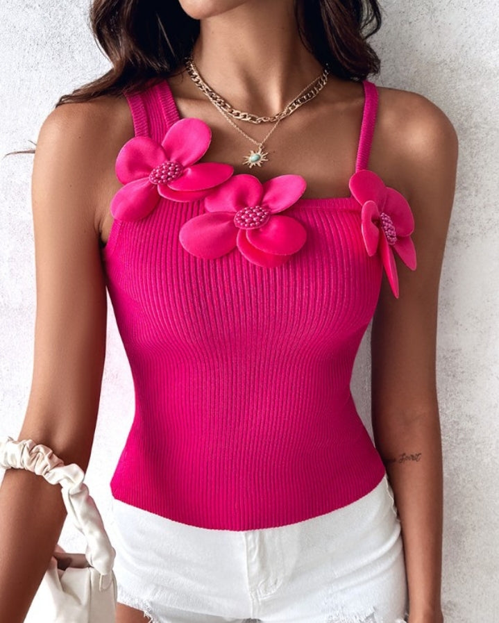 Premièrement : Ce 1 débardeur en tricot à motif floral et perles décoratives sans manches femme.