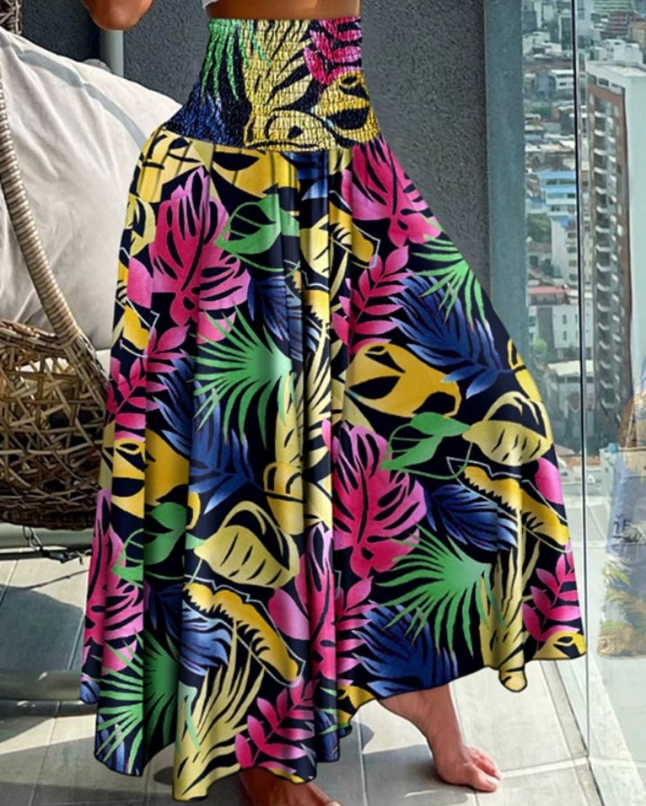 Premièrement : Le Pantalon larges , taille haute, à imprimé tropical femme, est la pièce parfaite pour insuffler une touche d’exotisme à votre garde-robe.